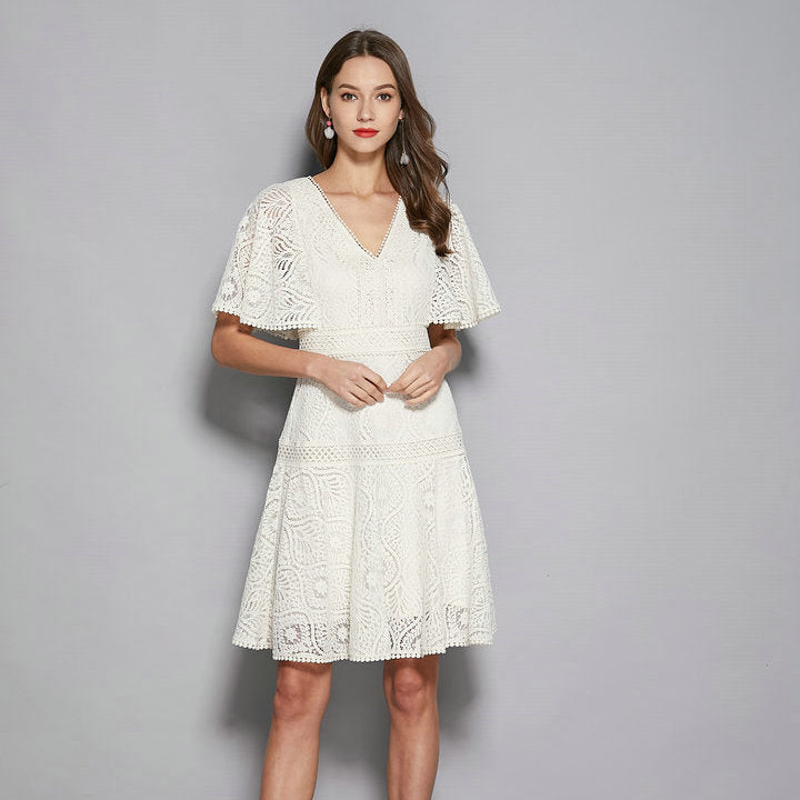 A slim v-neck dress with a summer lace
