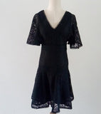 A slim v-neck dress with a summer lace
